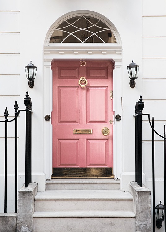  - Modern shot of a pink front door of an old villa in London.